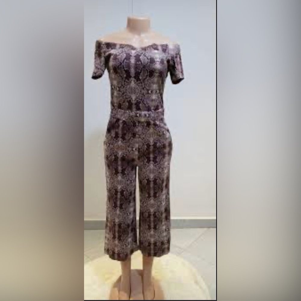 New York & Company brown and white snake print jumpsuit.  Size S